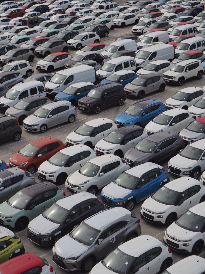 Aerial shot of a crowded car park in Barcelona, showcasing diverse vehicles.